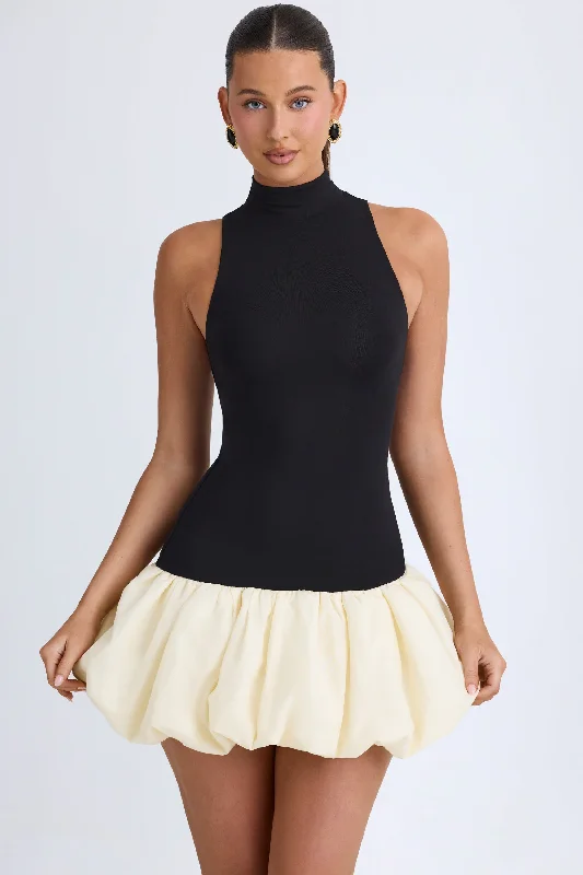 Mini dress with bow accents-Turtleneck Drop-Waist Bubble Hem Mini Dress in Black