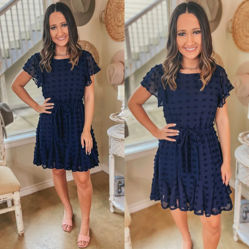 Mini dress with trumpet sleeves-Last Chance Size Large | Brunch Babe Ruffle Sleeve Swiss Dot Dress with Waist Tie in Navy