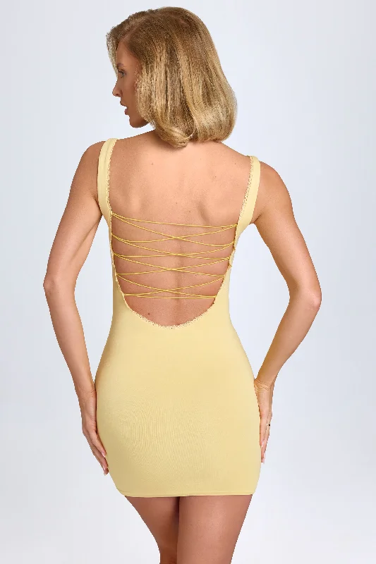 Mini dress with tulle overlay-Modal Lace-Trim Bodycon Mini Dress in Pastel Yellow